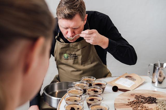 cuppers taste and quality check your coffee at BKI full-service coffee supplier