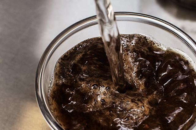 freshly brewed coffee in a cup ready for a taste test